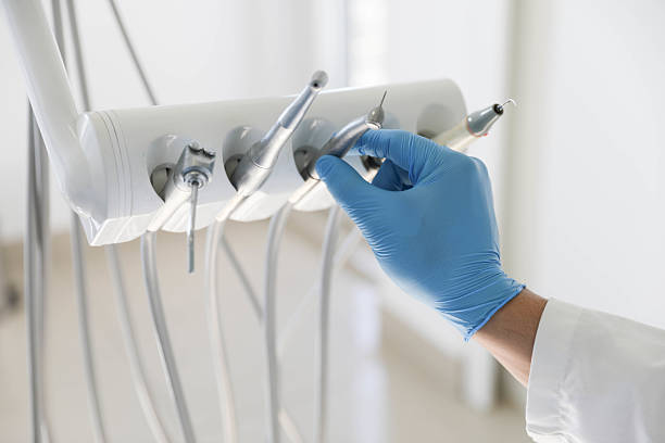 Professional Invisalign Clear Aligners technician working in Bellport, NY